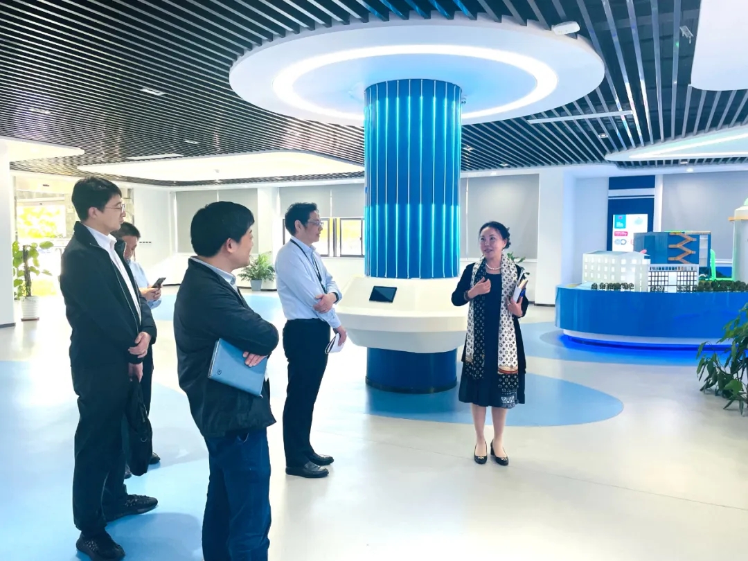 苏州市社保中心副主任朱敏峰一行莅临我司开展政协提案工作调研插图1